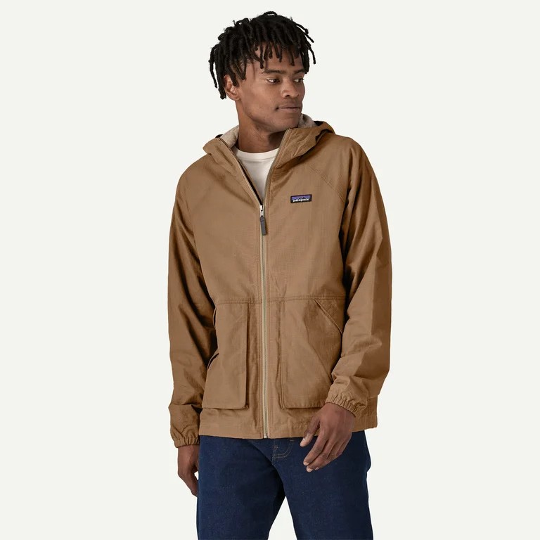 Patagonia Lightweight Waxed Cotton Jacket in slab khaki organic cotton ripstop, worn zipped over a white tee and dark jeans